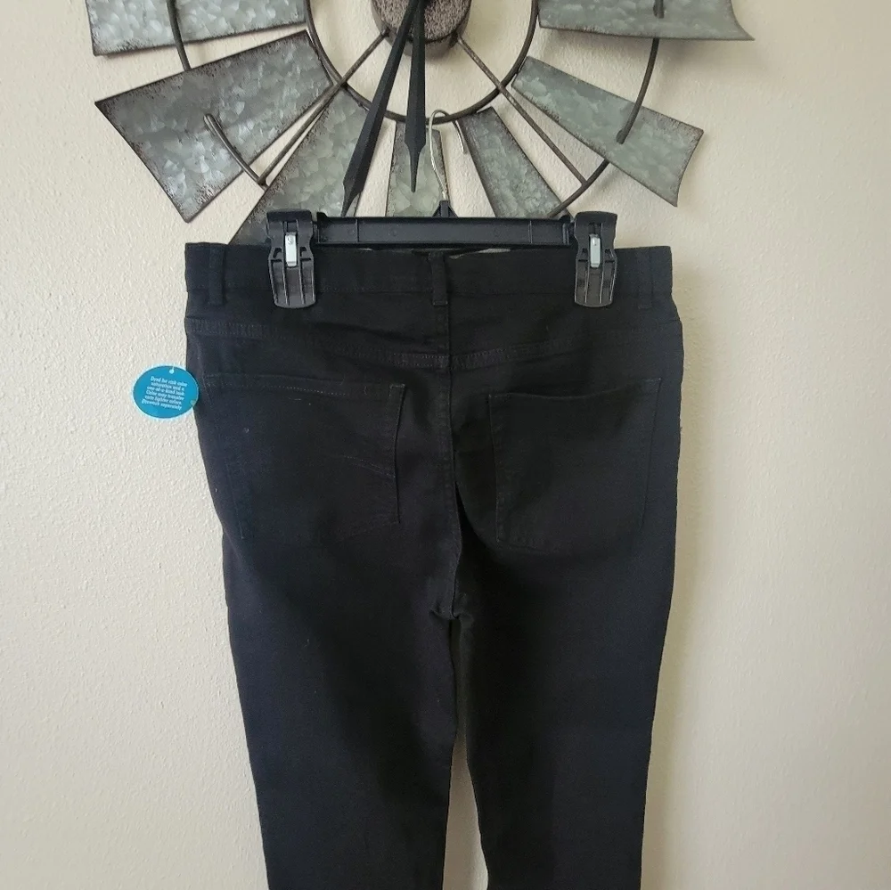 The children place Black super skinny jeans size 16 Husky.